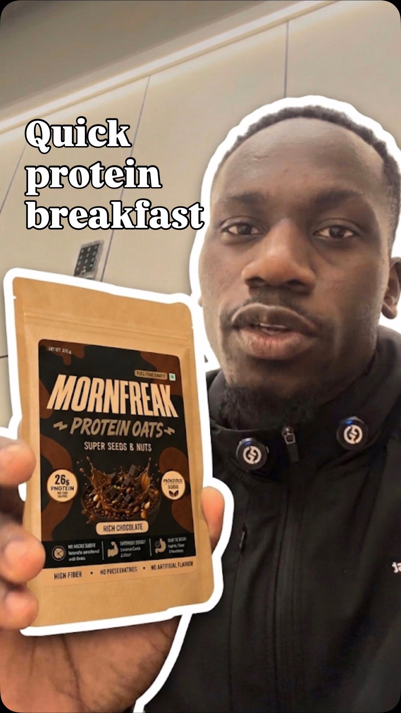 Man holding a pouch of Mornfreak Protein Oats with the overlay Quick protein breakfast